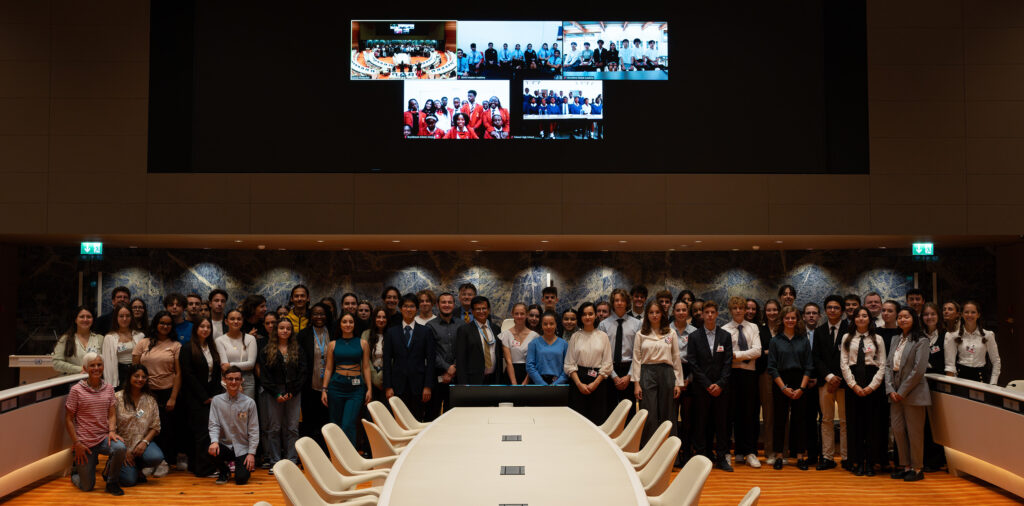 Group picture of the Global YCD at Palais des Nations. Photo: Lorenzo Franchi / UN CC:Learn